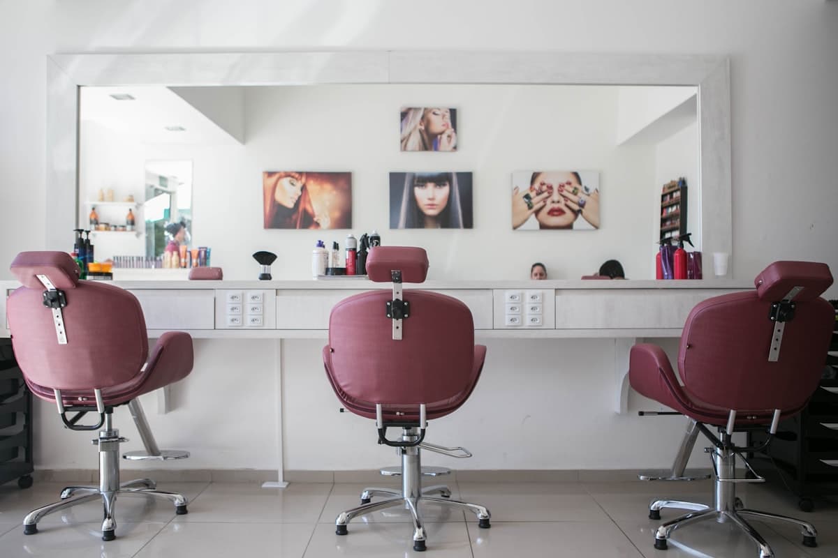 Bright and premium beauty salon interior with styling chairs and mirrors